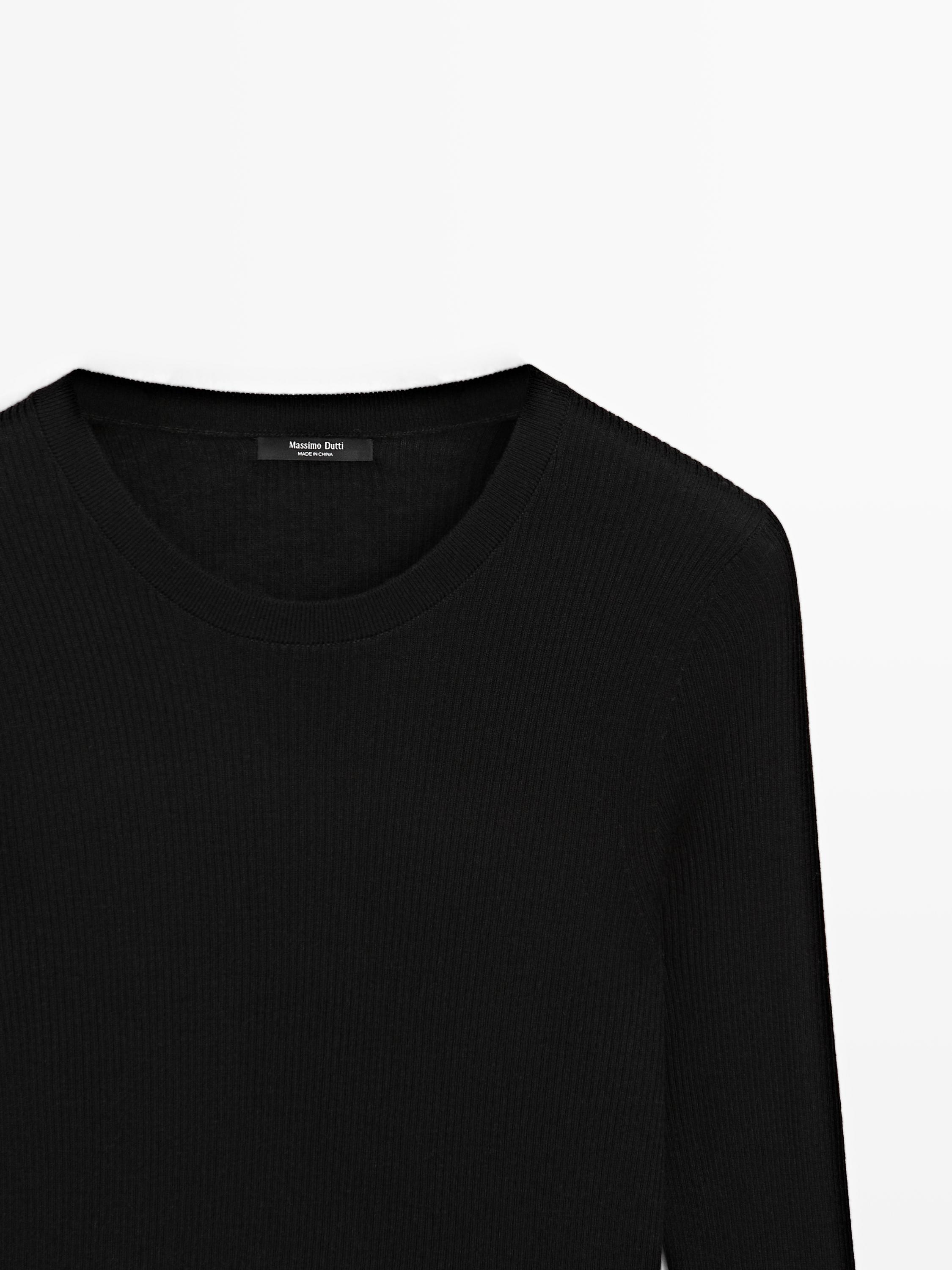 Ribbed knit round neck sweater